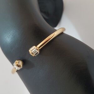 Henri Bendel deco petite hinged cuff in 12k overlay gold with Swarovski Crystal